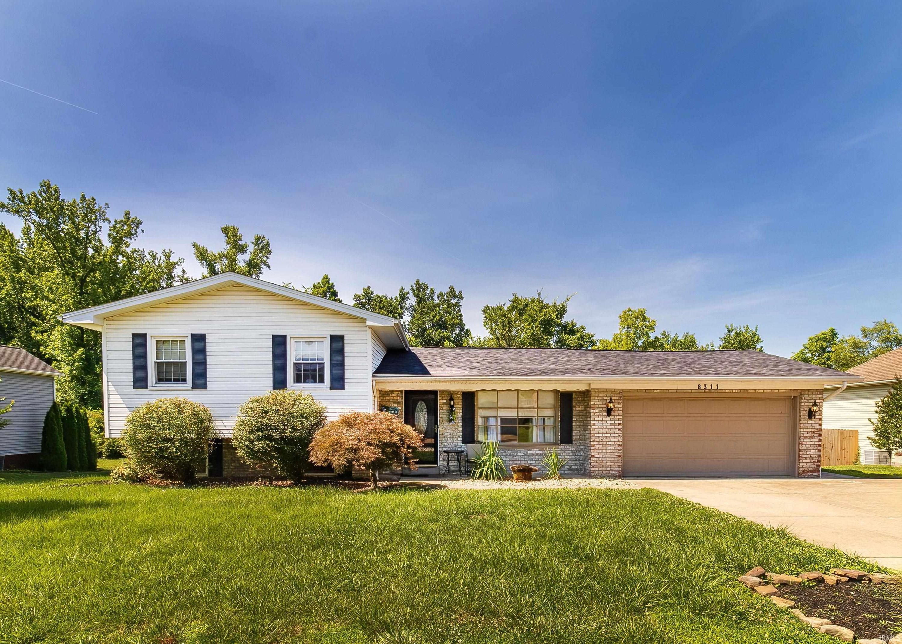 8311 Sycamore Drive, Newburgh — photo 1 of 30