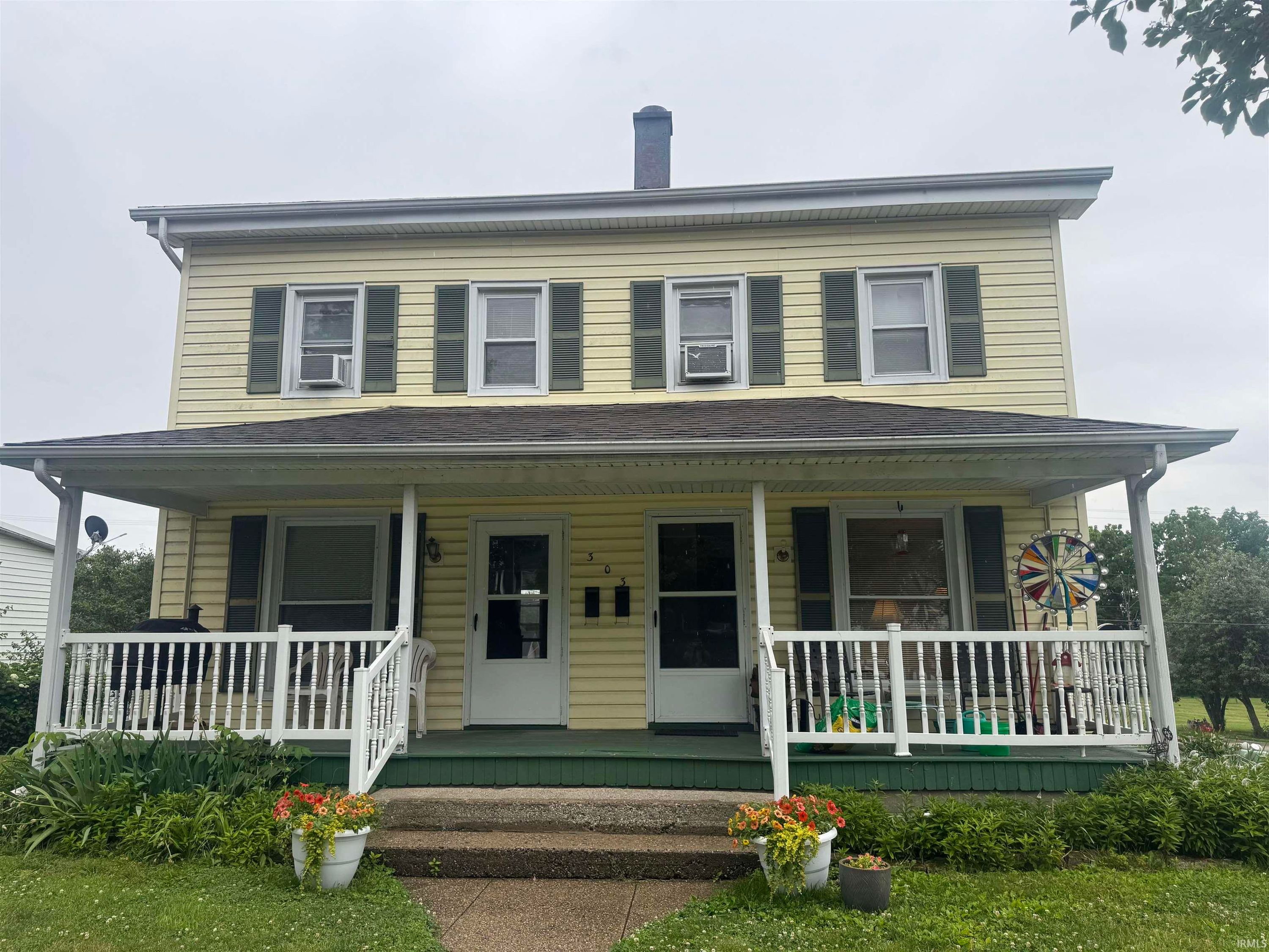 303 W Main Street, Syracuse — photo 1 of 20